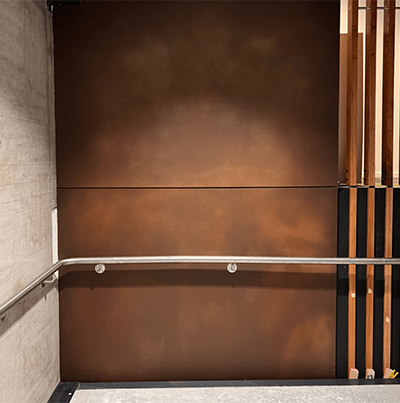 Corten Finish applied to blend internal stairway with the building exterior.